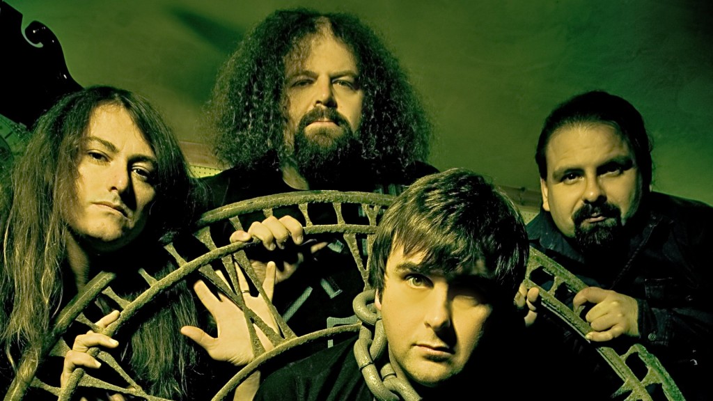 Napalm Death (em sentido horário): Mitch Harris (guitarra), Shane Embury (baixo), Danny Herrera (bateria) e Mark "Barney" Greenway (vocal)